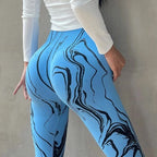 High waisted printed leggings in blue marble pattern, perfect for stylish workouts or casual wear