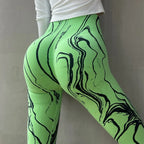 High waisted printed leggings in green with stylish marble pattern for a trendy workout look