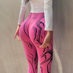 High waisted printed leggings in vibrant pink with a stylish marble design for a trendy look