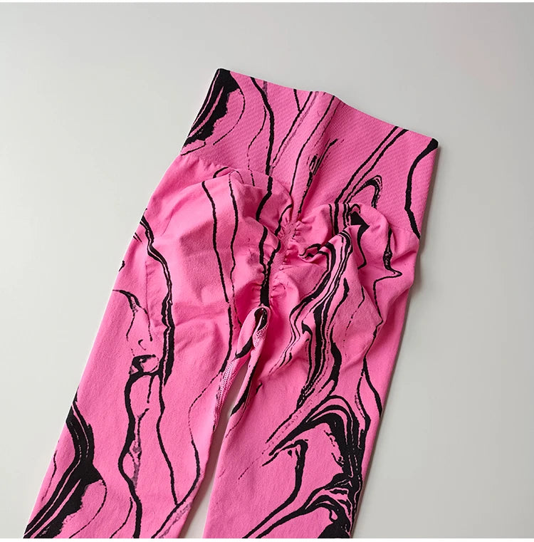 High waisted printed leggings in pink and black marble pattern from The Lady's Haven Boutique
