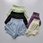 High-waisted sports shorts women in various colors including blue, black, green, purple, and yellow