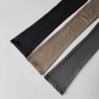 Three pairs of high waisted yoga pants bell-bottoms in black, beige, and gray for comfortable workouts
