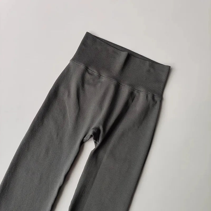 High waisted yoga pants bell-bottoms in dark gray with a wide waistband for added comfort