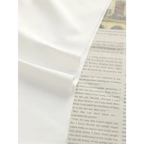 The Lady's Haven Boutique white hip lifting seamless panties for women displayed on printed paper background