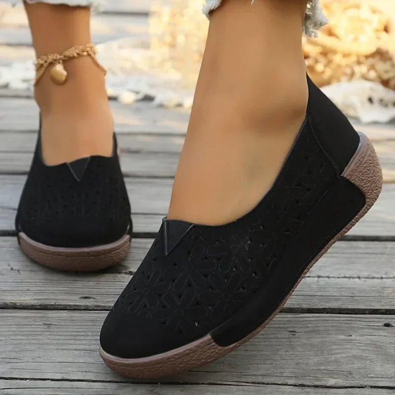Black hollow out casual shoes for ladies with soft brown soles and comfortable fit for everyday wear