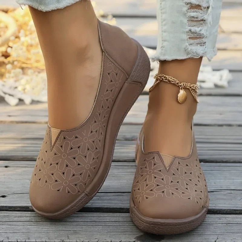 Brown hollow out casual shoes for ladies with floral cutout design and comfortable sole