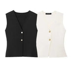 Black and white crop sweater vest with buttons from The Lady's Haven Boutique