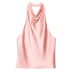 Soft pink satin halter crop top with draped neckline from The Lady's Haven Boutique