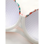 Close-up of white padded cups with floral trim on island vacation bra and panty set from The Lady's Haven Boutique