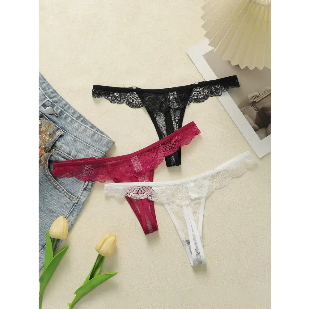 The Lady's Haven Boutique lace low waisted thongs in black red and white with floral lace design