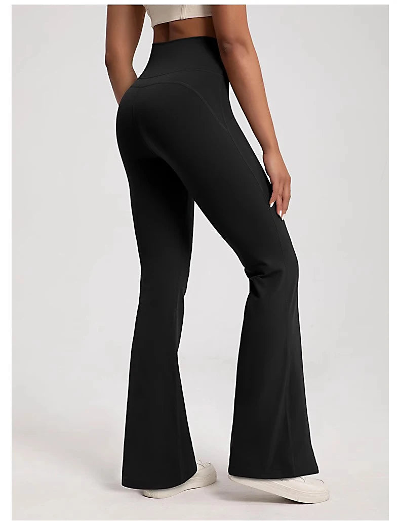 Black ladies bell-bottom yoga pants with a flattering fit and comfortable high waistband
