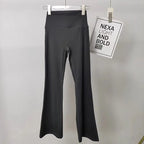 Ladies bell-bottom yoga pants in black with a high-waisted design for comfort and flexibility