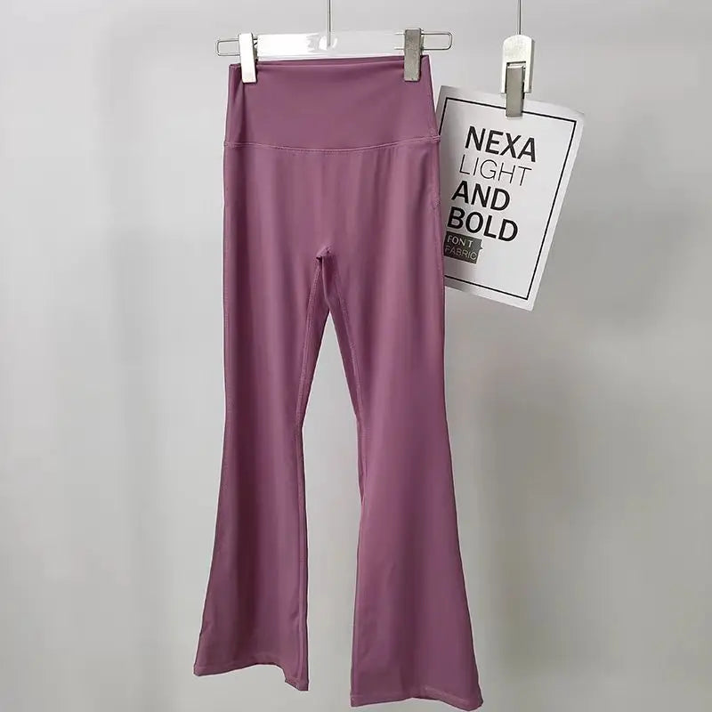 Ladies bell-bottom yoga pants in soft lavender, perfect for comfort and style during workouts