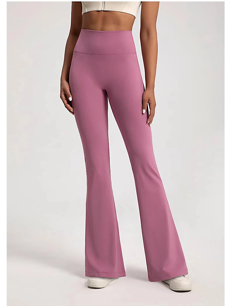 Ladies bell-bottom yoga pants in pink for comfortable and stylish workouts