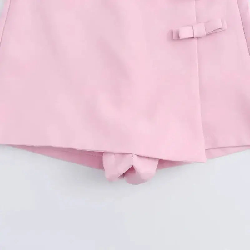 Pink casual mid waist short skirt with bow detail from The Lady's Haven Boutique