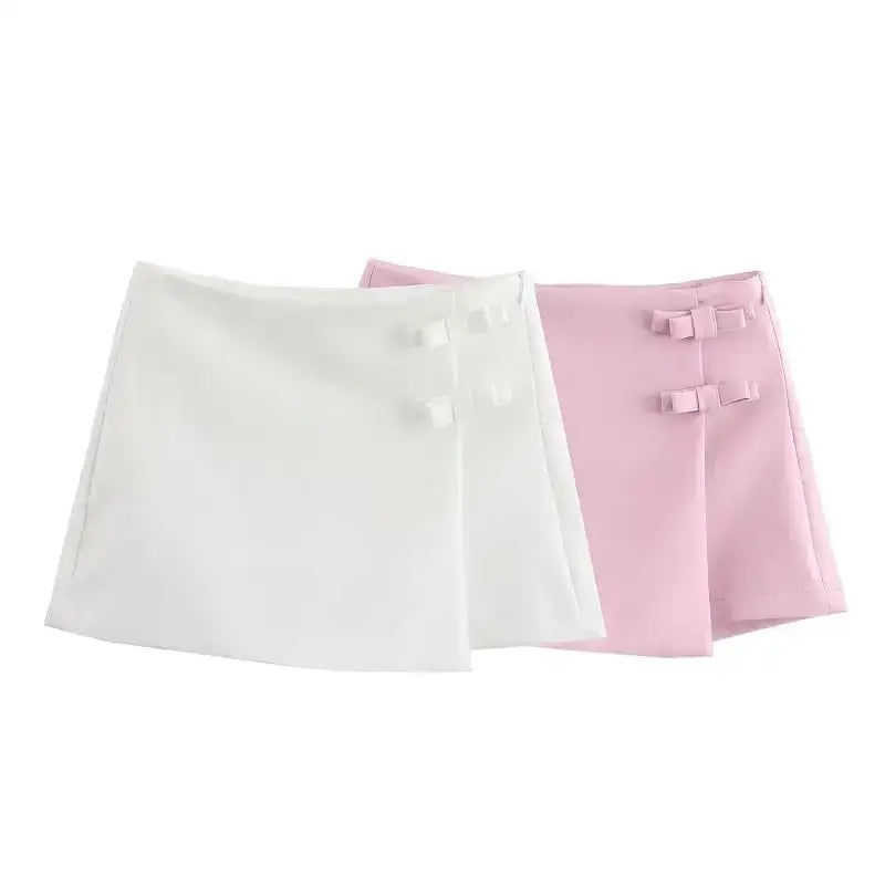 Casual mid waist short skirt in white and pink with side bow details from The Lady's Haven Boutique