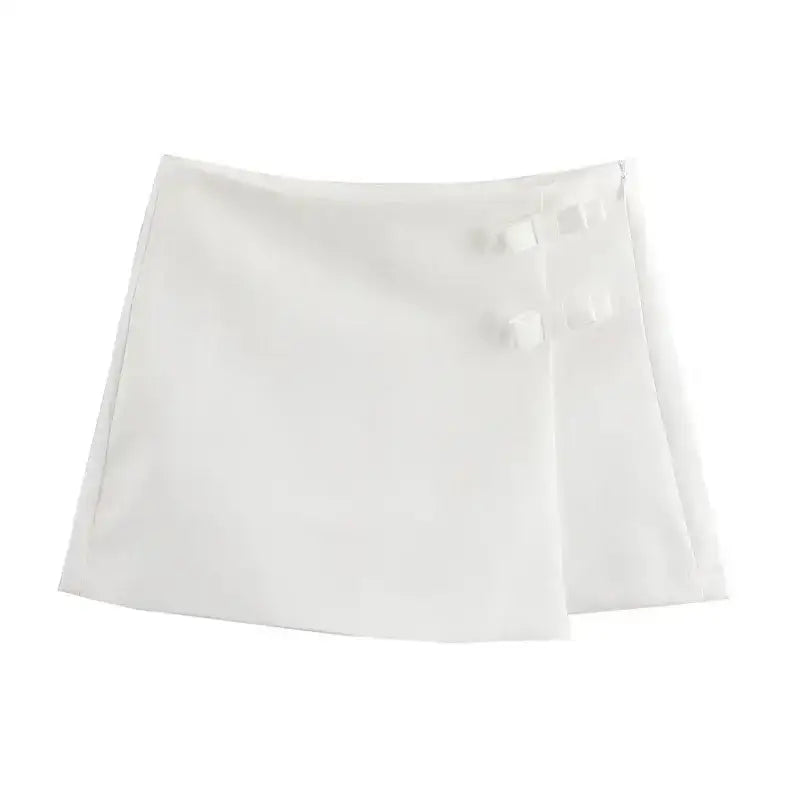 White casual mid waist short skirt with decorative side bows from The Lady's Haven Boutique