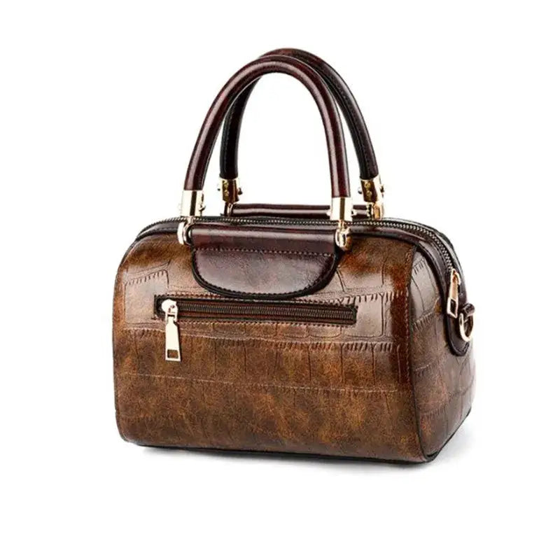 Stylish ladies designer shoulder handbag in brown with a structured design and top handles