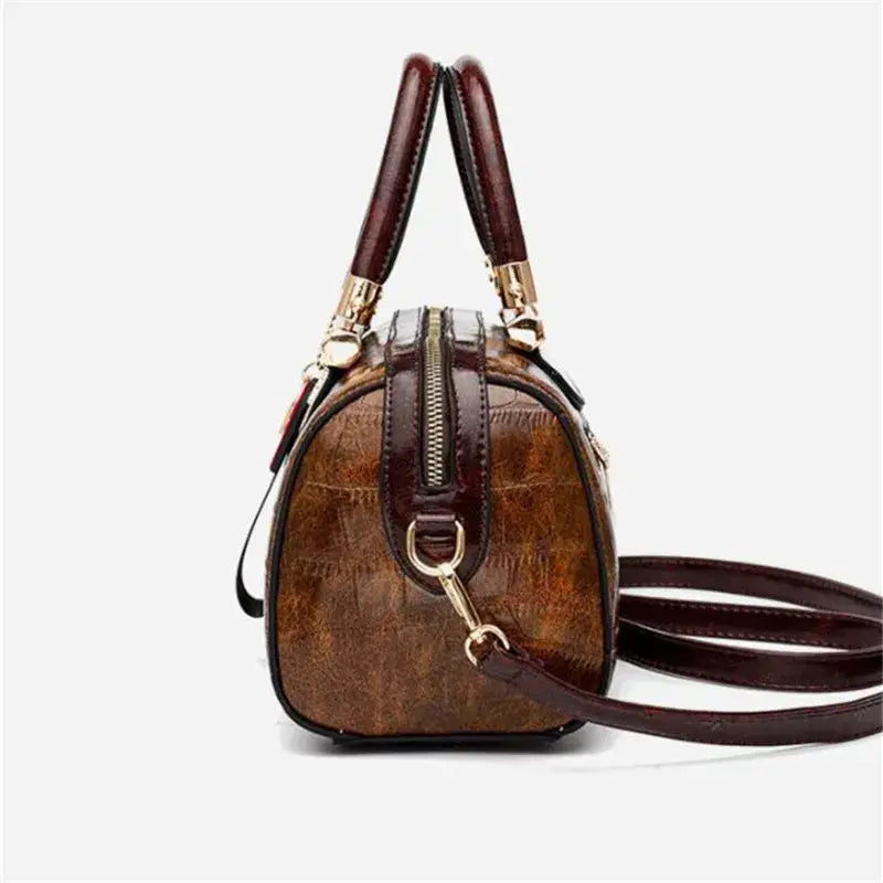 The Lady's Haven Boutique ladies designer shoulder handbag in brown with stylish zipper and shoulder strap