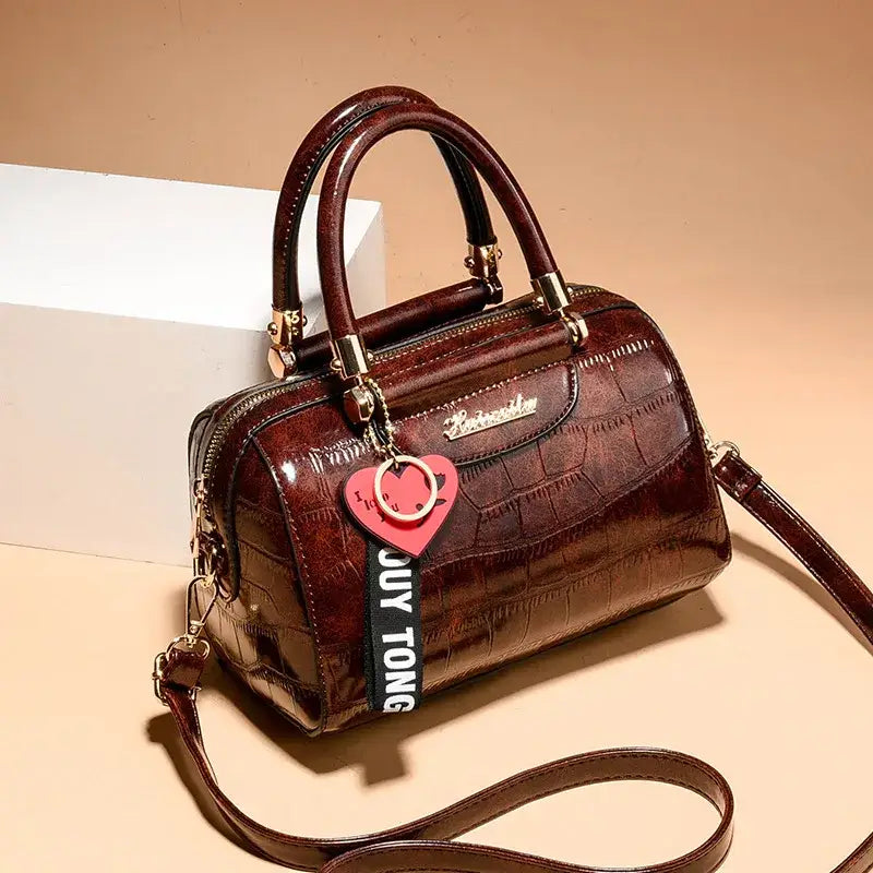 Ladies designer shoulder handbag in dark brown faux crocodile leather with detachable strap and charm