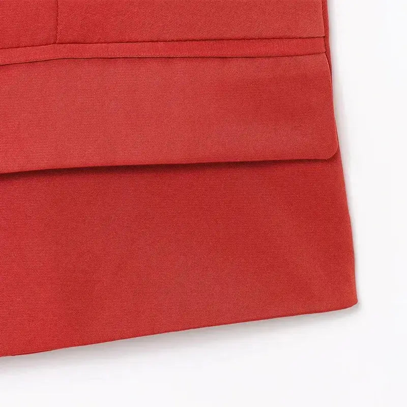 Close-up of red fabric pocket detail on elegant spring summer waistcoat from The Lady's Haven Boutique