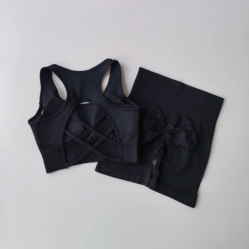 Black ladies fitness clothing set featuring a stylish sports bra and matching high-waisted leggings