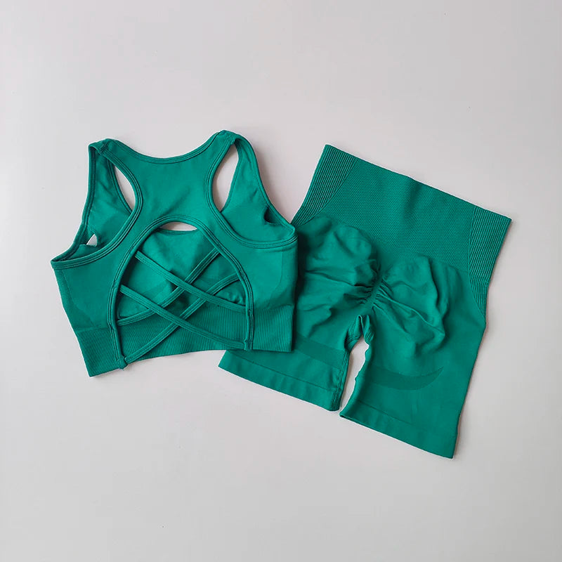 Teal ladies fitness clothing set featuring a stylish sports bra and matching high-waisted shorts