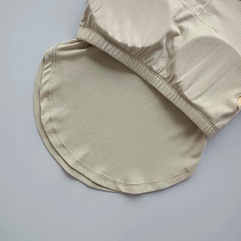Beige ladies fitness crop tops with soft fabric and seamless design for comfortable workout wear