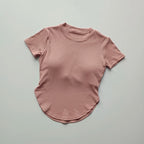 Light pink ladies fitness crop top with a comfortable fit for workouts and casual wear
