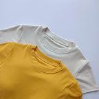 Set of ladies fitness crop tops in yellow and gray for stylish activewear options