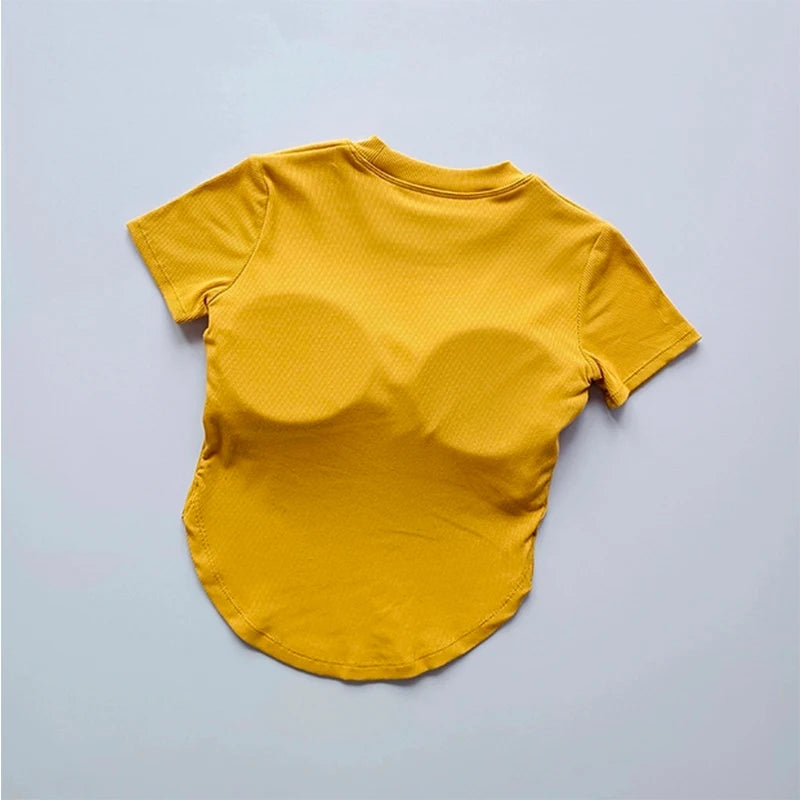 Yellow ladies fitness crop tops with a sleek design for active wear and workouts