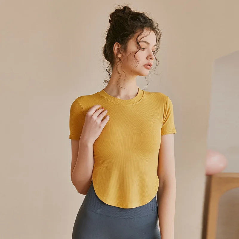 Stylish yellow ladies fitness crop tops for comfortable workouts and stylish layering