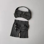 Ladies fitness outfit matching set featuring a stylish black bra and fitted shorts for active wear