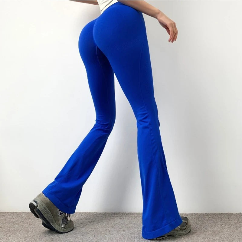 Blue ladies fitness sweat pants with a flared design, ideal for workouts and casual wear