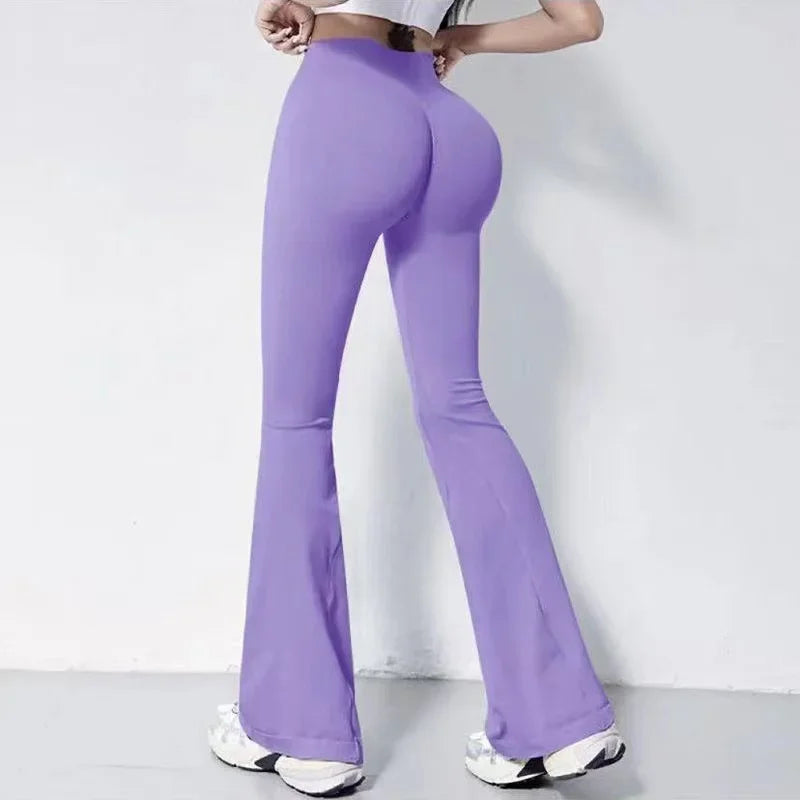 Purple ladies fitness sweat pants with a flared design for comfortable workouts and casual wear