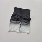 Ladies high waist running shorts in a stylish gray ombre design for comfort and mobility during workouts