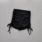 Black ladies high waist workout shorts with adjustable side ties for a comfortable fit