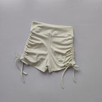 Cream Ladies High Waist Workout Shorts with Adjustable Side Ruching for Comfort and Style
