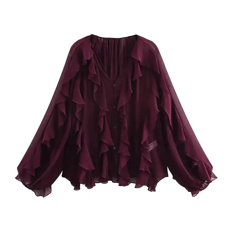 Wine colored long sleeve fashionable blouses with ruffle details and button front from The Lady's Haven Boutique