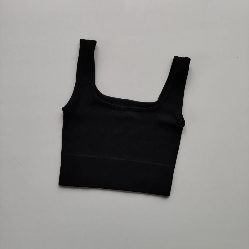 Ladies seamless yoga vest in black, perfect for comfortable workouts and casual wear