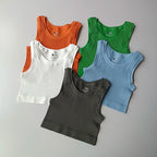 Ladies seamless yoga vest collection in multiple colors including orange, green, blue, white, and gray