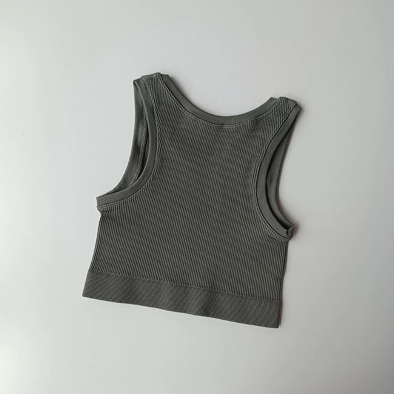 Ladies seamless yoga vest in olive green with comfortable ribbed fabric for activewear