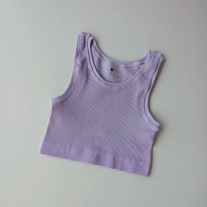 Light purple ladies seamless yoga vest with a ribbed texture for comfortable workouts