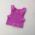Ladies seamless yoga vest in vibrant pink for comfortable and stylish workout sessions
