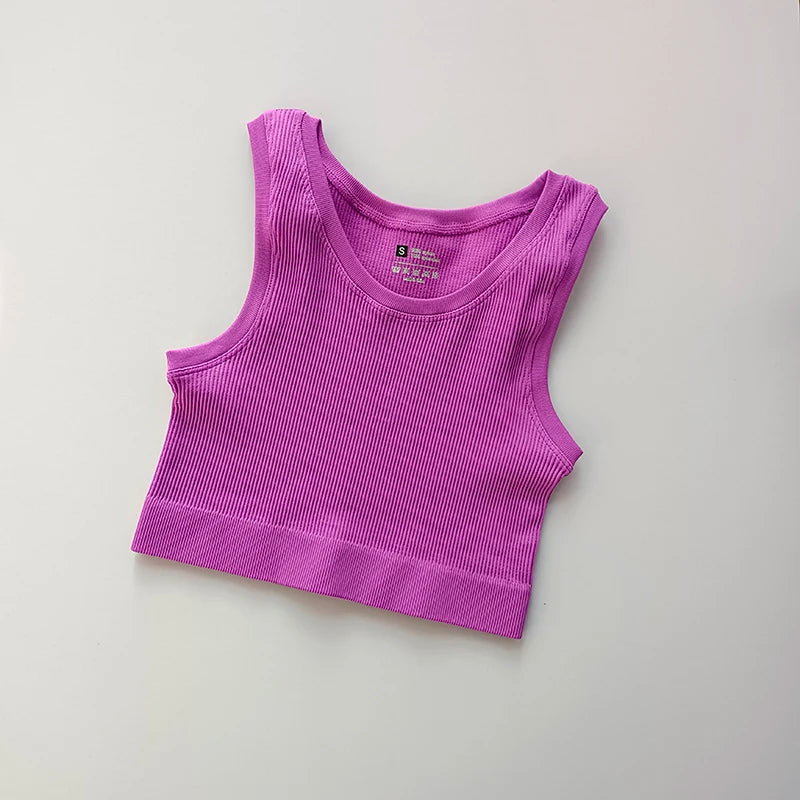 Ladies seamless yoga vest in vibrant pink for comfortable and stylish workout sessions