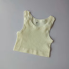 Ladies seamless yoga vest in soft yellow ribbed fabric for comfortable activewear