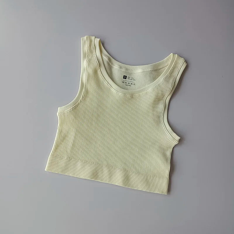 Ladies seamless yoga vest in soft yellow ribbed fabric for comfortable activewear