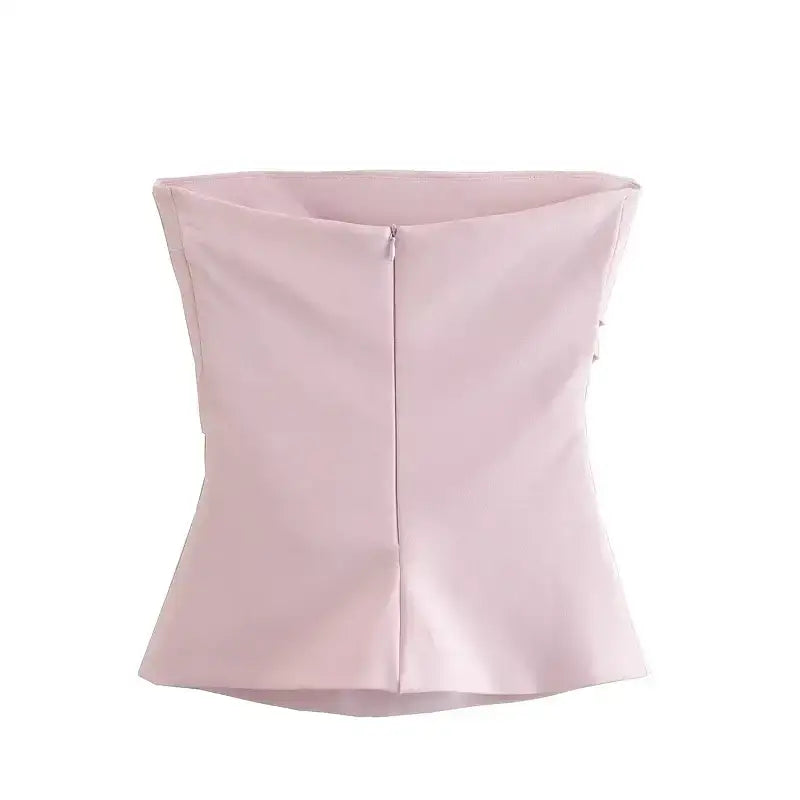 Light pink strapless corset top from The Lady's Haven Boutique with back zipper closure