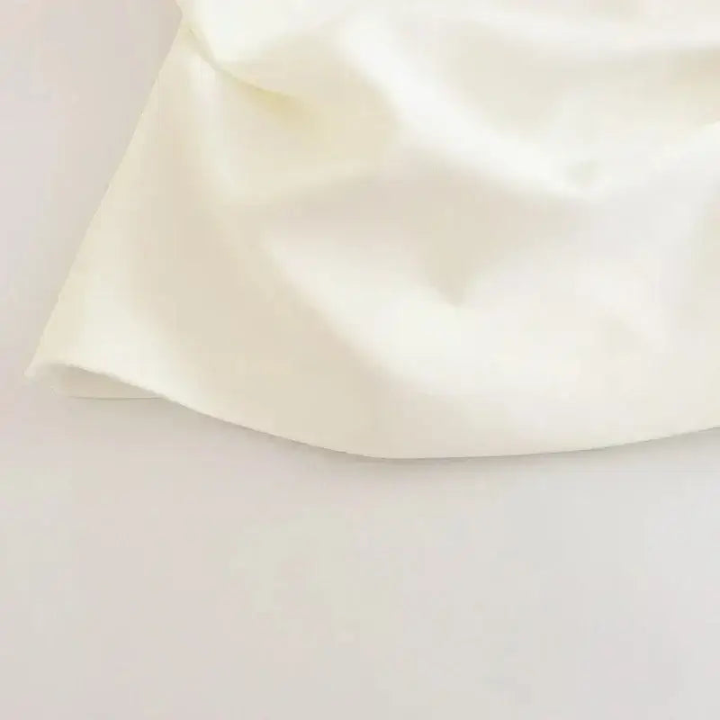 Cream satin strapless corset top with smooth fabric from The Lady's Haven Boutique