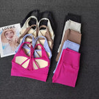 Ladies two piece gym suit collection featuring various colors and stylish designs for workout comfort